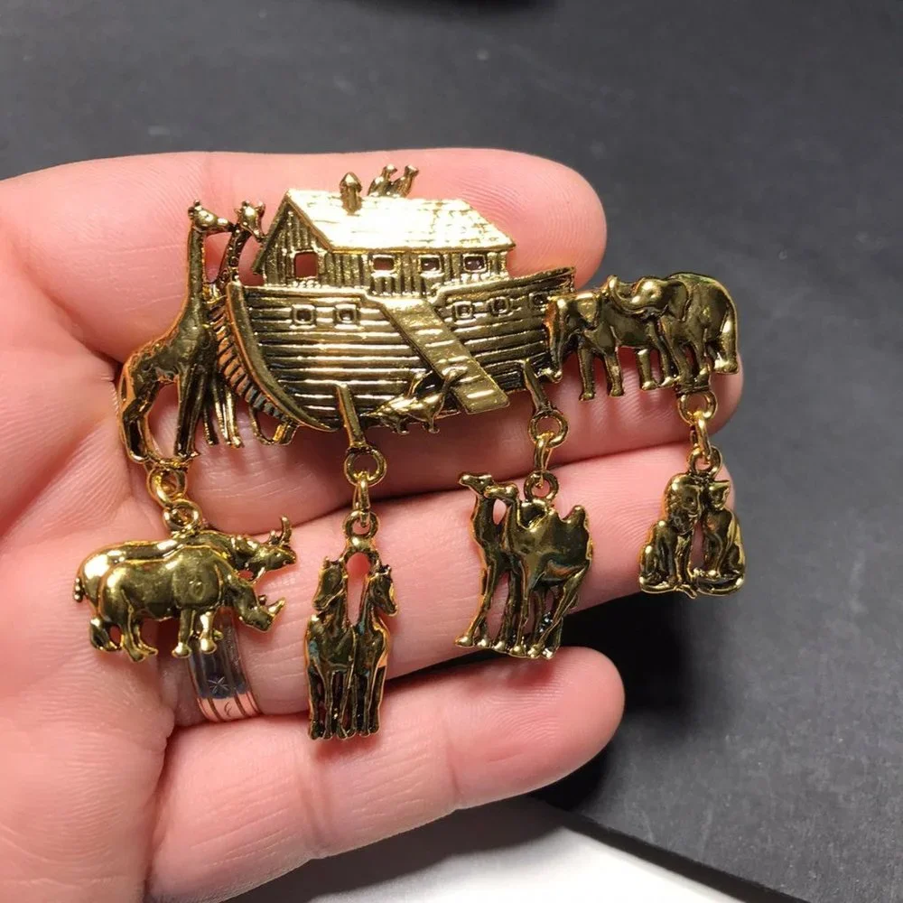 Gold tone Noahs ark brooch pin with animal dangle charms